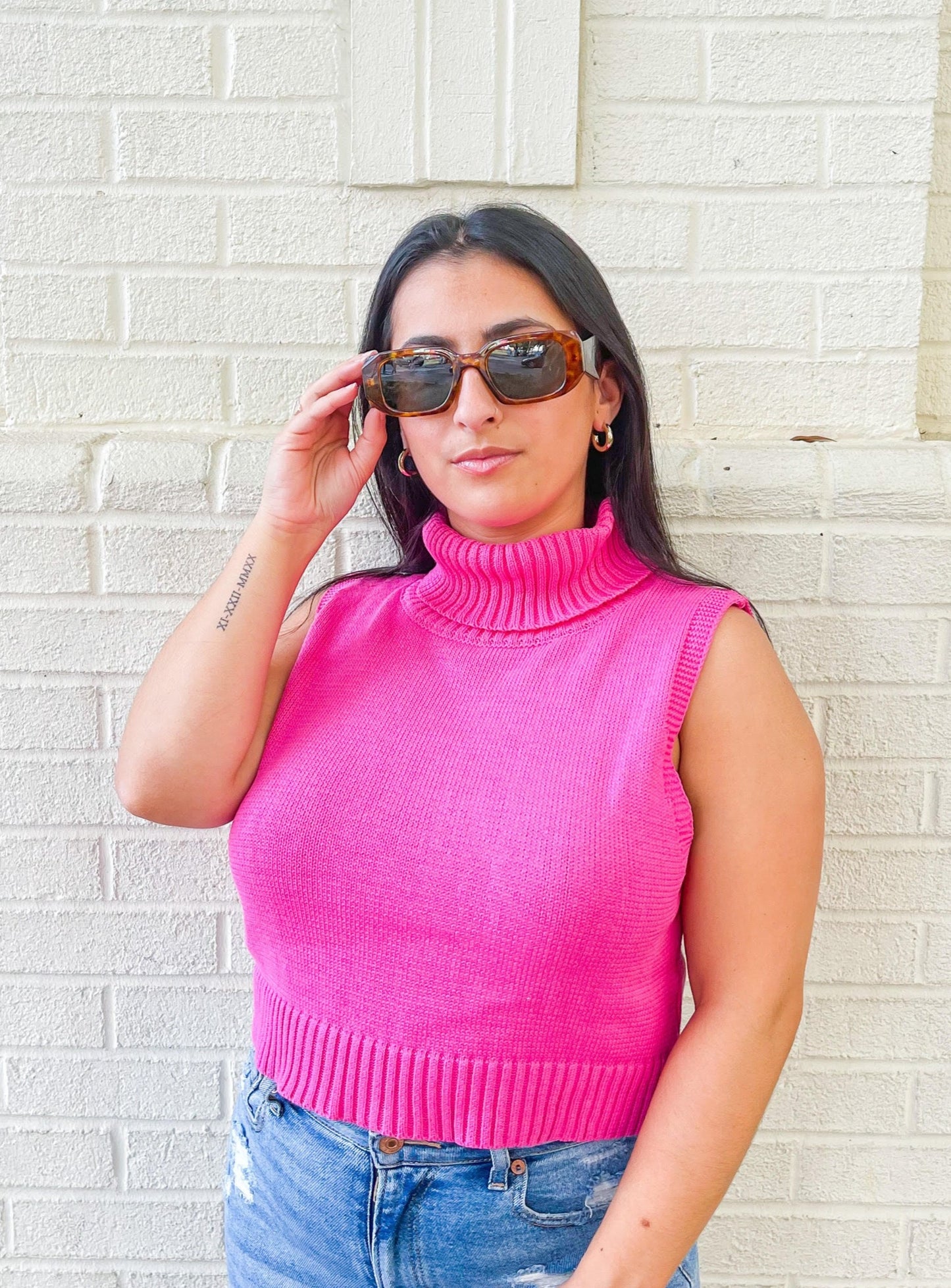 brown trendy rectangular sunglasses with tortoise print and medium sized lenses.