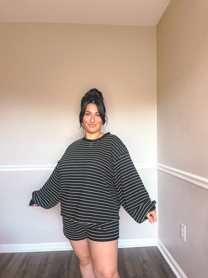 Cozy black and white striped lounge set featuring oversized top and matching shorts.