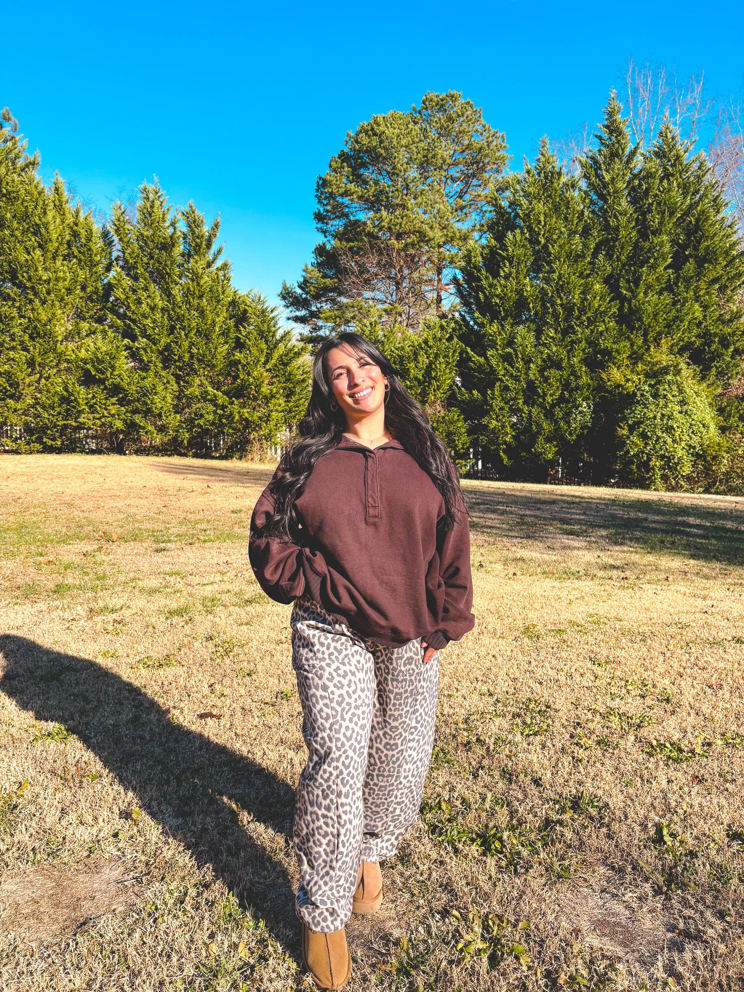 Cozy brown pullover with leopard print pants, perfect for casual outdoor wear. Cheetah pants for sale, paired with brown long sleeve pullover (not for sale).