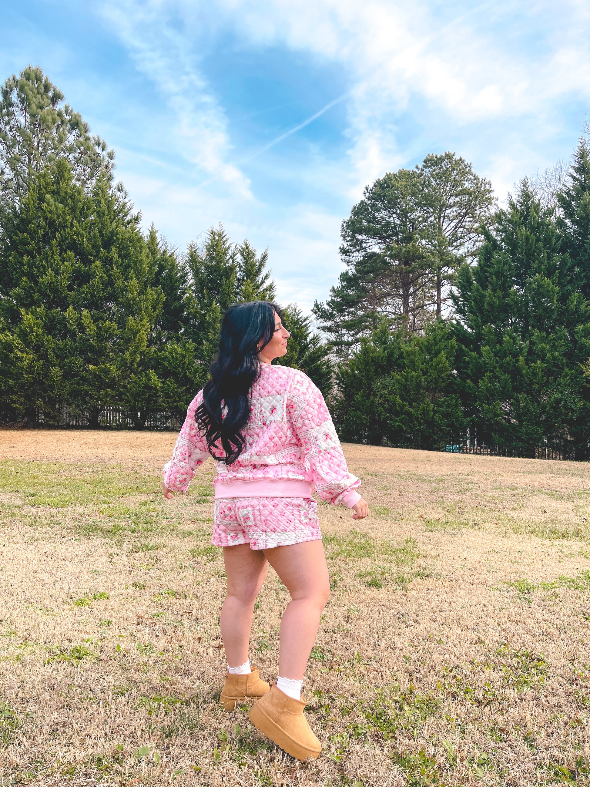 Women's pink quilted loungewear set with floral patterns, perfect for casual outdoor wear.