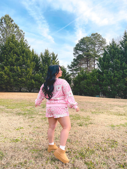 Women's pink quilted loungewear set with floral patterns, perfect for casual outdoor wear.